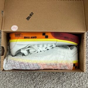 Vans White Low-Top Sneakers with Yellow-to-Red Gradient Sole
